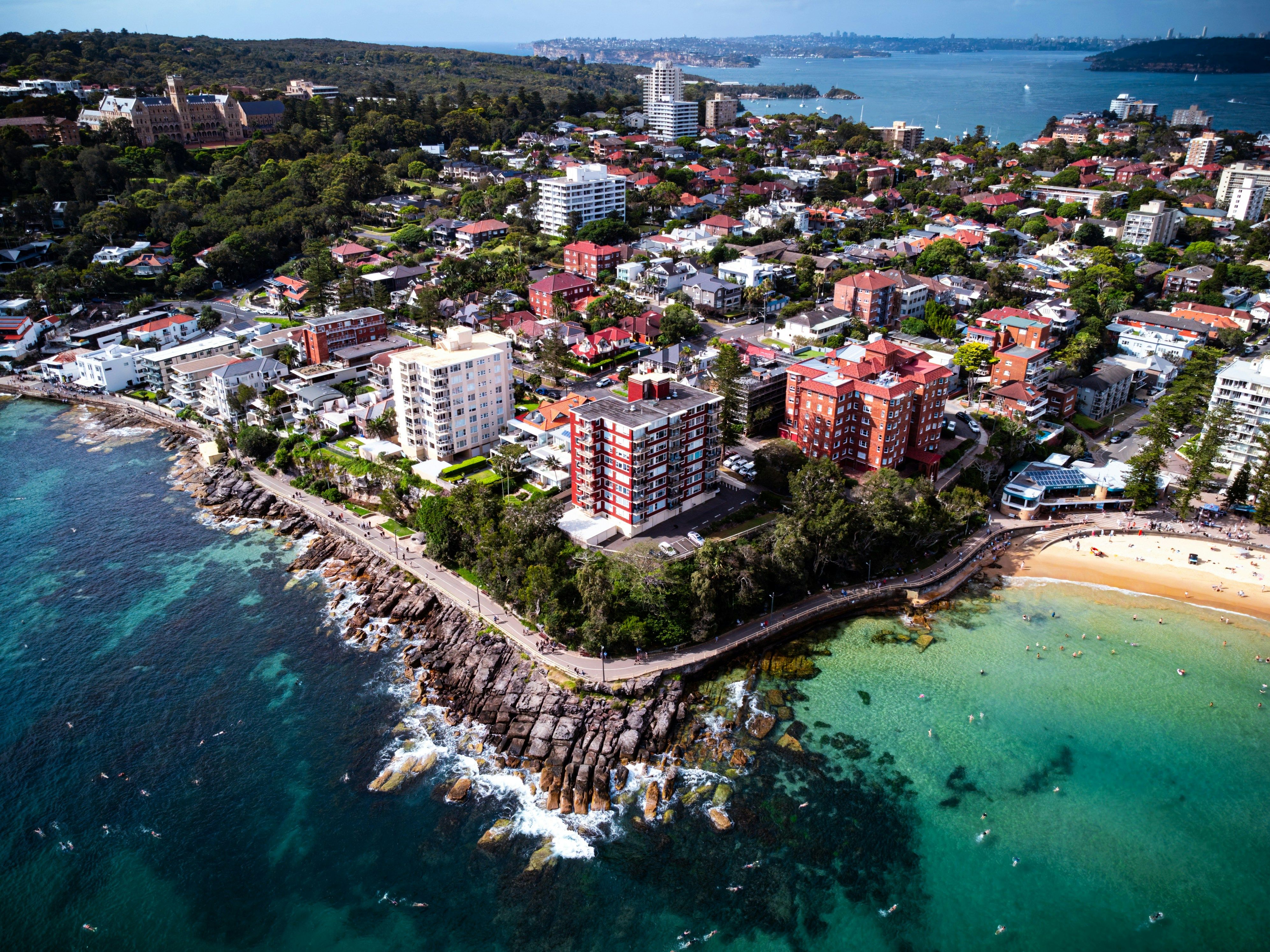 Misty view over a Sydney harbourside suburb at golden hour