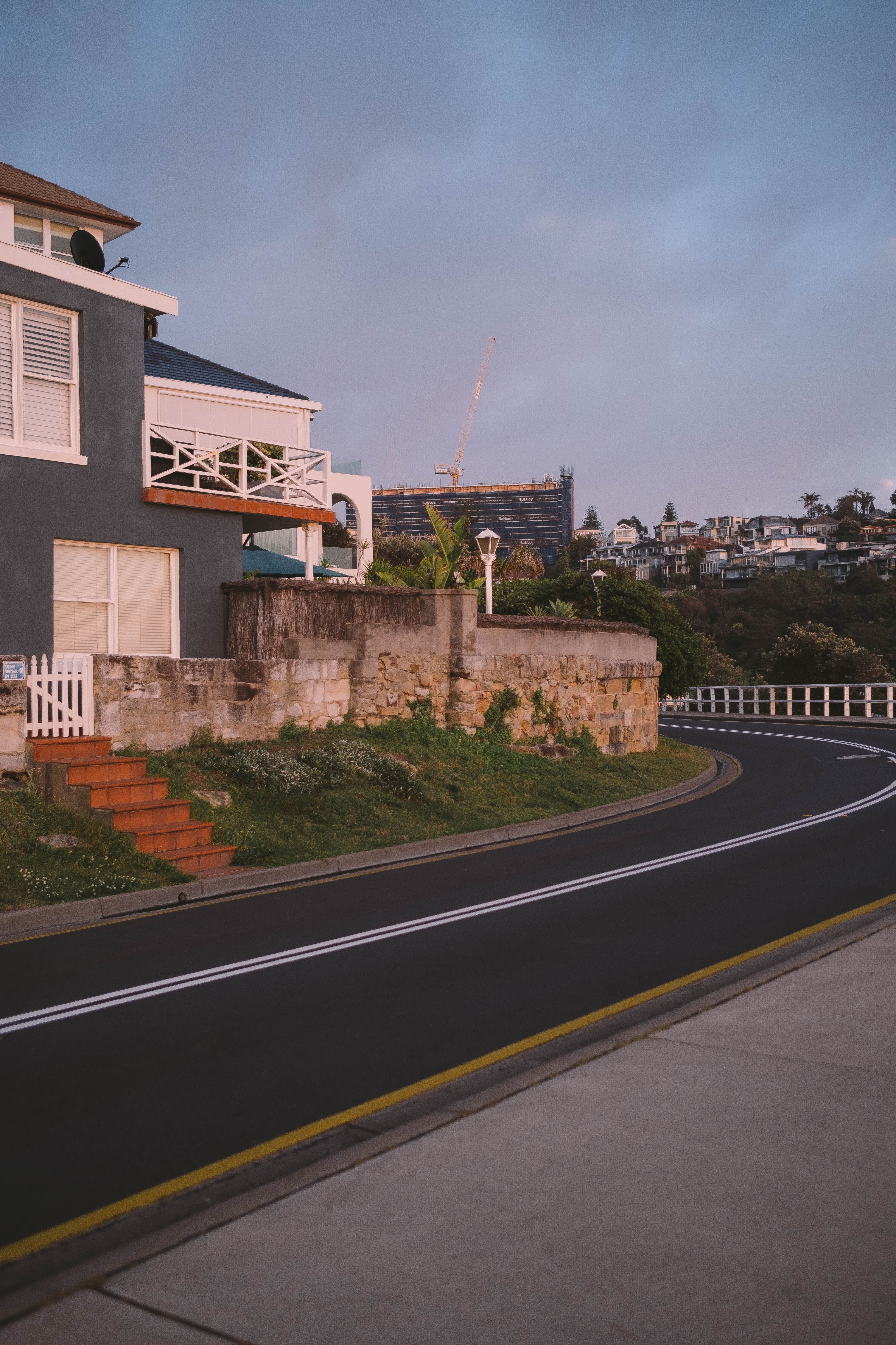 Aerial view of the Manly headland and coastline at sunset